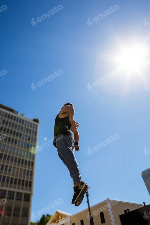 Preview: Extreme athlete jumping in the air in the city