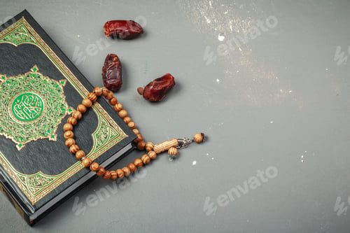 Preview: Table top decoration Ramadan Kareem holiday background of dates with rosary & The holy book of