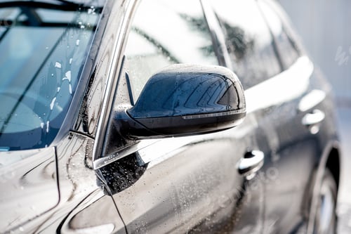 Preview: Close-up of a car after the washing