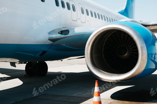 Preview: Close-up of an airplane on the runway, turbine