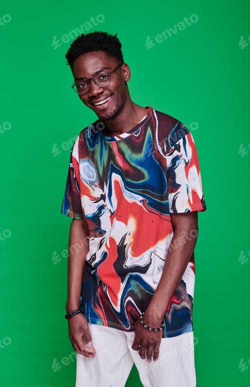 Preview: African teenage boy in bright shirt
