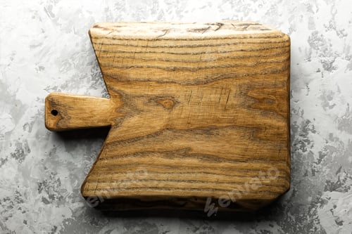 Preview: Old oak wood board on grunge concrete table