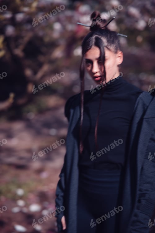 Preview: Beautiful young woman wearing kimono with cherry blossoms, sakura view
