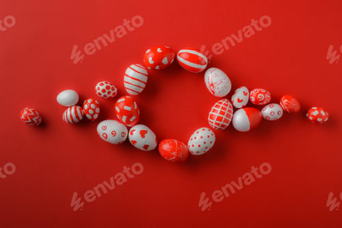 Preview: Easter backgrounds with a round frame of red and white Easter eggs on a bright red background.