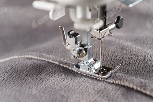 Preview: Modern Sewing Machine With Gray Velours Fabric Close Up