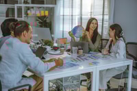 Preview: Startup team collaborates on color selection for user centric product design, optimizing experience