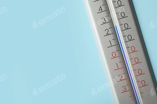 Preview: Weather thermometer on light blue background, closeup. Space for text