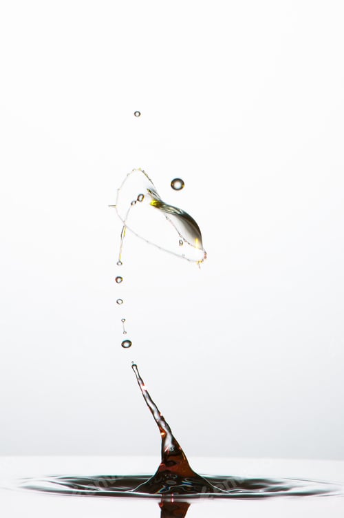 Preview: Splash of colorful liquid with high speed flash