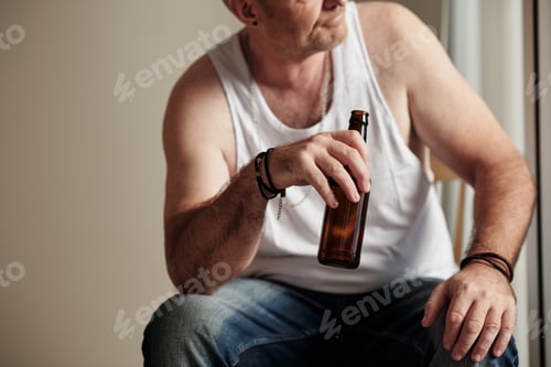 Preview: Pensive Man Drinking Beer