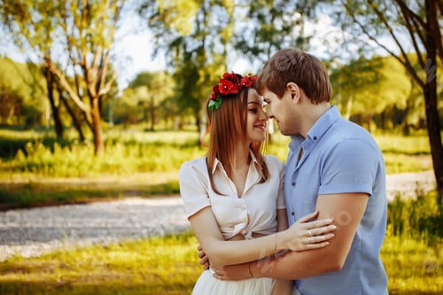 Preview: Couple in love in the summer in the forest. Love. Embrace