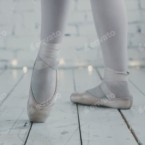 Preview: Young ballerina dancer in tutu showing her techniques