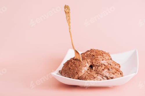 Preview: Cake in square plate with fork against pink background