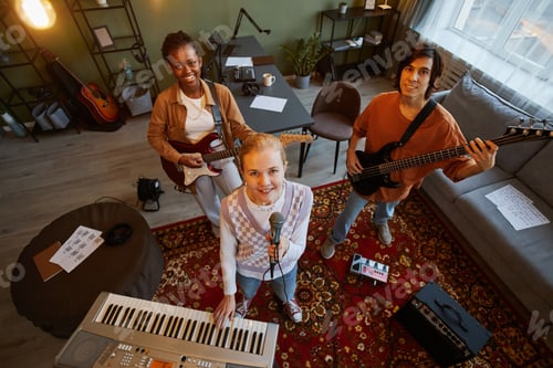 Preview: Young Music Band Singing Top View