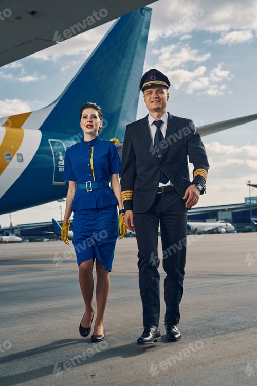 Preview: Cabin crew in beautiful uniforms walking ahead