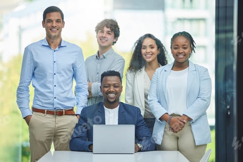 Preview: Making waves in the business sector. Shot of a team of businesspeople in their office together.