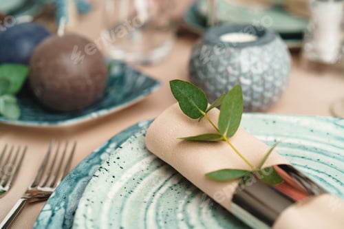 Preview: Luxury green table setting decorated with candles