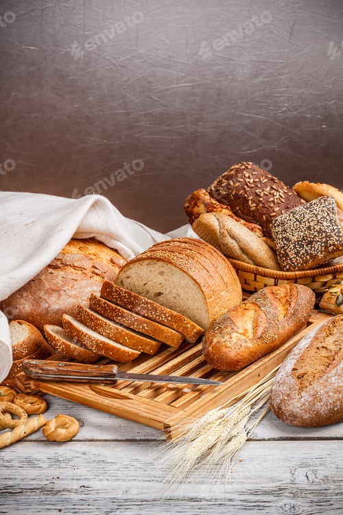 Rustic Breads, Wheat and a Cutting Board