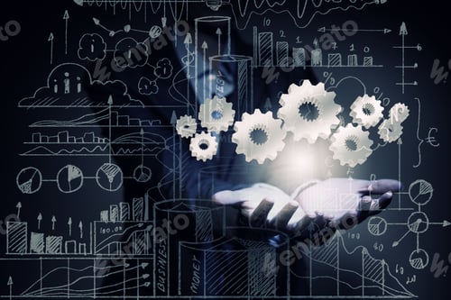 Preview: Close Up Of Businesswoman Holding Gears In Hand