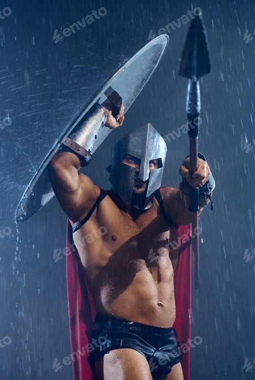Preview: Spartan hiding from rain under shield