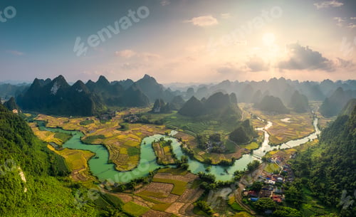 Preview: Phong Nam Valley with rice field and river flows through traditional village in countryside