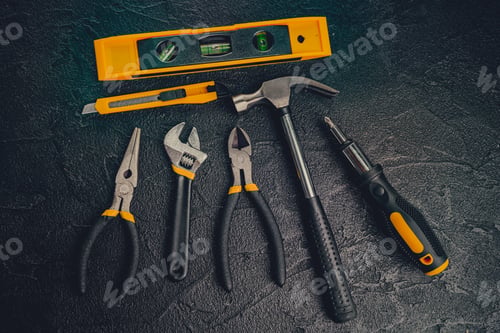 Preview: Many different tools for repair work on a black background