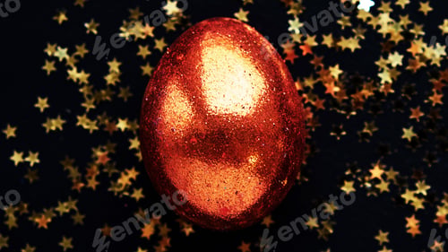 Preview: one golden easter eggs on black background. banner for text