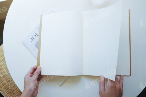 Preview: Top of hands open blank catalog, magazines,book mock up on table