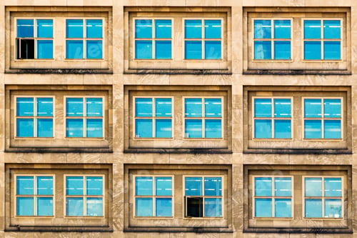 Preview: Beautiful view of blue windows of an old building