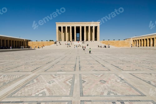 Preview: Monumental Architecture With Visitors Under Clear Blue Sky