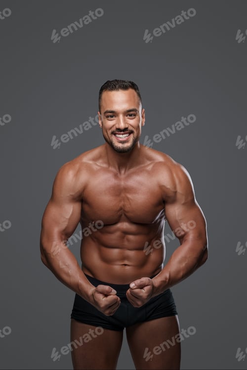 Preview: Handsome male model with a chiseled physique flashes a charming smile