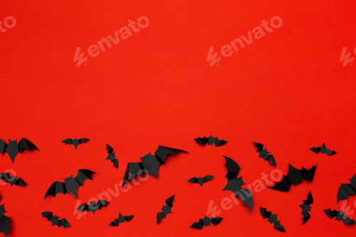 Preview: halloween and decoration concept - paper bats flying