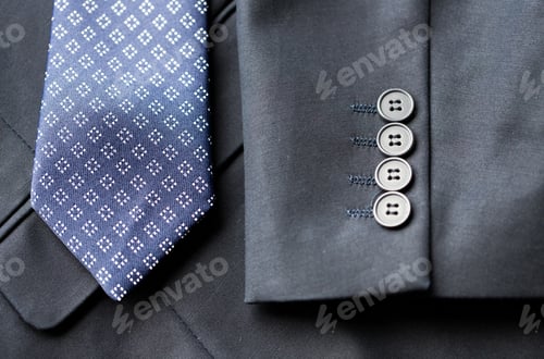 Preview: close up of business suit jacket and tie