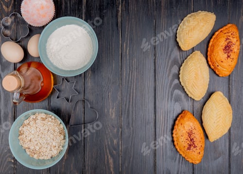 Preview: top view of bakery products as shakarbura with flour, oat flakes, butter on wooden background with