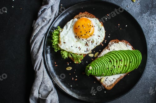 Preview: Avocado Sandwich (Healthy Snack) Menu Concept. Food Background. Top View. Copy Space
