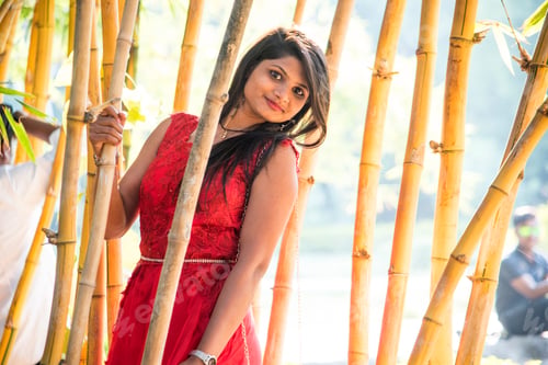 Preview: Happy smiling girl in bamboo forest.