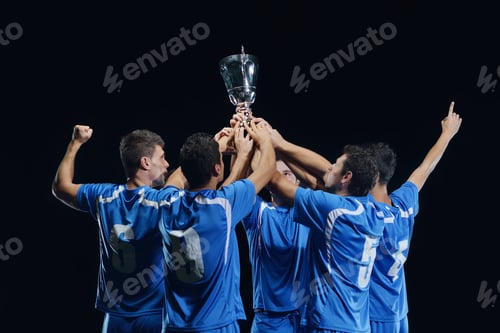 Preview: Soccer Players Team Group Celebrating The Victory And Become Champion Of Game While Holding Win Coup