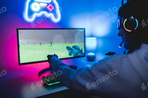 Preview: Metaverse concept - Gamer girl playing strategy video game wearing augmented reality headset