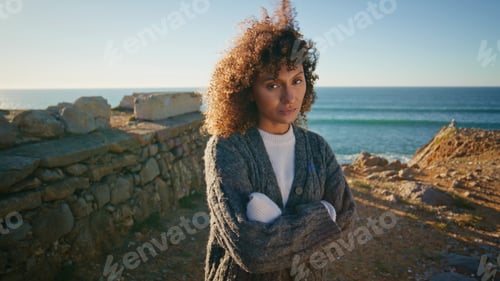 Preview: Sensual woman posing ocean enjoying sea nature portrait. Model looking camera