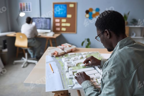 Preview: Architect developing plan of construction