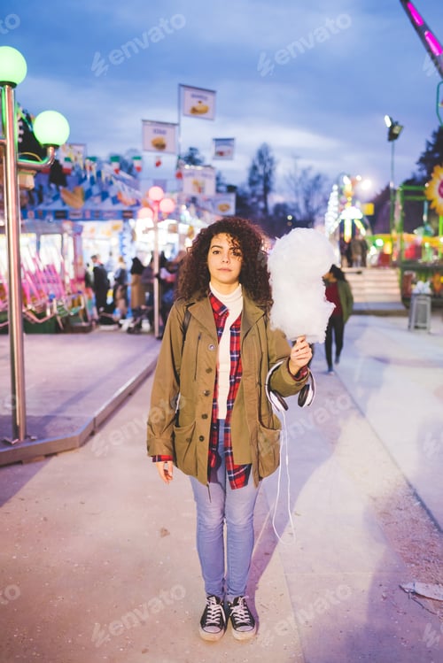 Preview: Young multiethnic woman outdoor enjoying city