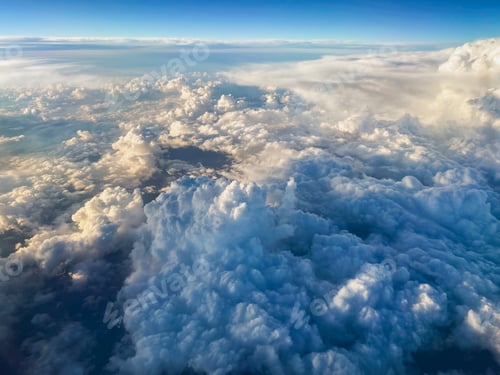 Preview: Breathtaking view of a vast expanse of fluffy white clouds floating in the sky