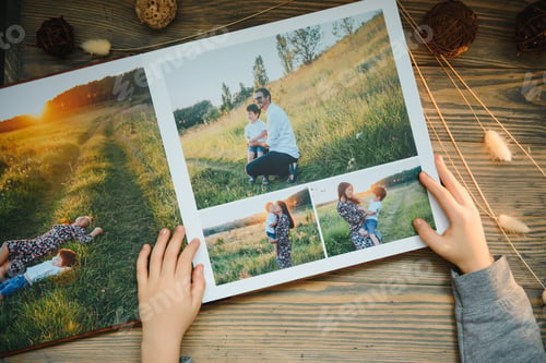 Preview: Luxury wooden photo book on natural background. Family memories photobook.