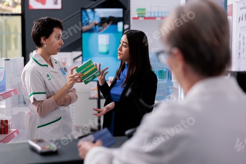 Preview: Pharmaceutical worker listening to customer complaint about aspiring medication