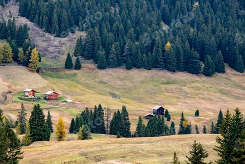 Preview: Wooden travel cabin tourist houses outdoor in the hill in autumn.