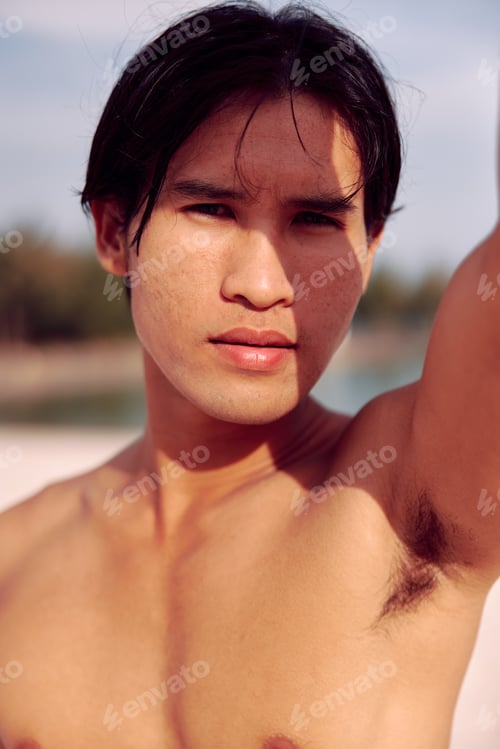 Preview: Active Asian Athlete Enjoying Sunset Run on the Beach