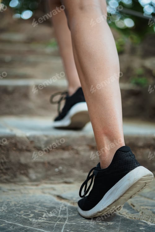 Preview: Close up shot of girl running up stairs