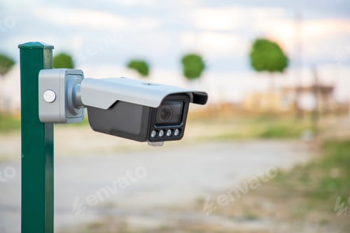 Preview: Security CCTV camera on a pylon with a blurred background