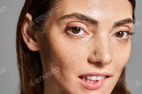 Preview: Freckled beauty: portrait of a woman with natural charm