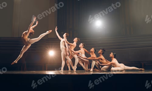 Preview: Shot of a group of ballet dancers practicing a routine on a stage