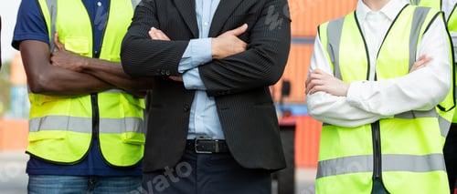 Preview: Group of team logistic worker and manager standing in arms crossed at container warehouse